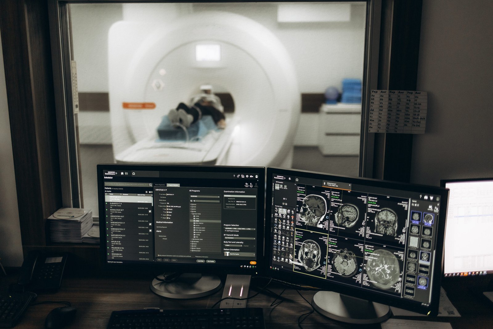 A well-lit examination room in a modern radiology center, featuring a team of professional radiologists and healthcare specialists intently focused on their work. In the foreground, a radiologist carefully analyzes high-resolution medical scans displayed on a state-of-the-art monitor, their expertise and concentration evident in their expression. In the middle ground, other members of the healthcare team confer, discussing findings and treatment plans. The background showcases advanced imaging equipment and diagnostic tools, conveying the advanced capabilities of this specialized facility. The overall scene exudes a sense of precision, dedication, and a commitment to providing the highest standard of care.